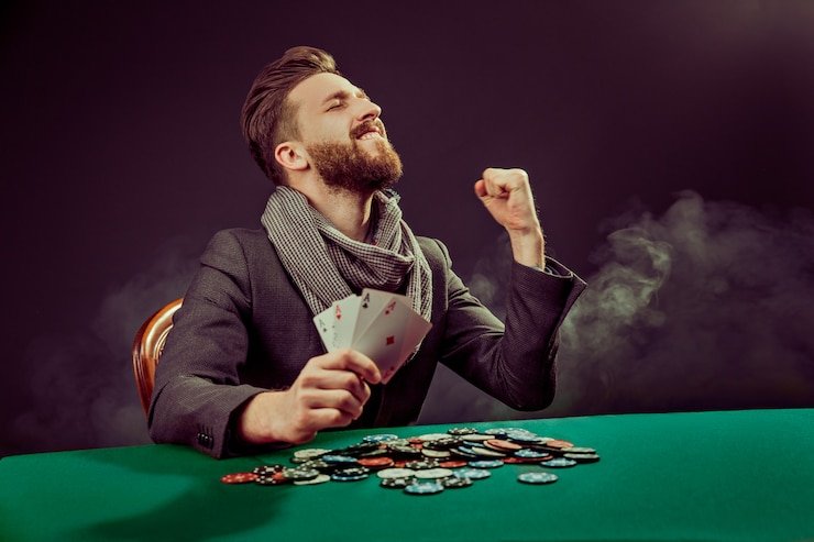 Filipino player using a smartphone to access 1234ph sports and casino features